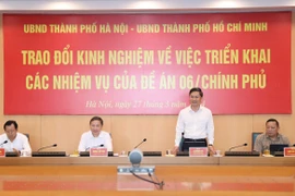 Hà Nội và TP Hồ Chí Minh trao đổi kinh nghiệm để "cùng đi nhanh hơn" trong thực hiện Đề án 06 của Chính phủ