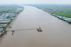 Dân hỏi - UBND TP trả lời: Có được cấp phép xây dựng khi đất nằm trong khu vực hành lang sông Đáy?