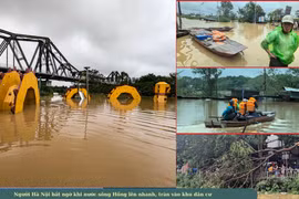 Ảnh: Người Hà Nội bất ngờ khi nước sông Hồng lên nhanh, tràn vào khu dân cư