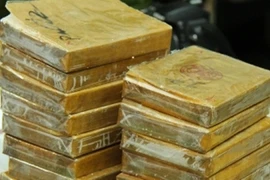 Phóng xe máy vận chuyện 45 bánh heroin