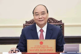 Chủ tịch nước Nguyễn Xuân Phúc điện đàm với Tổng thống Romania Klaus Werner Iohannis 