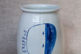 Làm thơ trên gốm