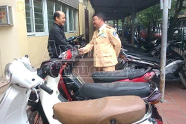 Nhận lại xe máy sau 4 năm bị mất