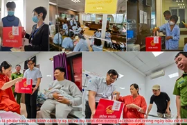 Chuyện lá phiếu sau vách kính cách ly xạ trị và nụ cười chào đời trong ngày bầu cử ở Thủ đô