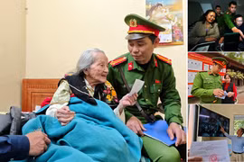 Tấm thẻ cử tri trên đôi tay cụ bà 96 tuổi và những bước chân tận tụy vì ngày hội lớn