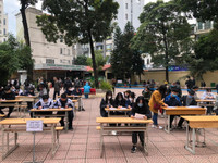 Hình ảnh lực lượng Công an cấp căn cước gắn chip cho học sinh tại điểm tiêm vaccine