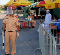 [Ảnh] Lực lượng chức năng siết chặt phòng chống dịch Covid-19 tại các cửa ngõ của Thủ đô