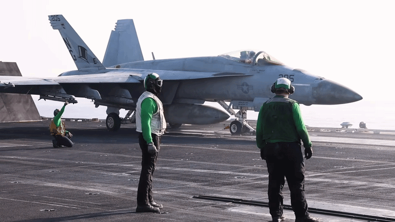 aircraftlaunchfromtheflightdeckofnimitz-classaircraftcarrierussabrahamlincolncvn72insupportofoperationepicfury-ezgifcom-video-to-gif-converter-3.gif