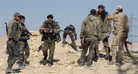 [ẢNH] Bashar al-Assad, người trụ vững giữa một chiến trường Syria đầy máu lửa