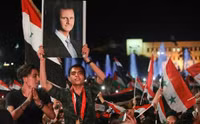 [ẢNH] Bashar al-Assad, người trụ vững giữa một chiến trường Syria đầy máu lửa