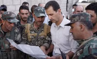 [ẢNH] Bashar al-Assad, người trụ vững giữa một chiến trường Syria đầy máu lửa