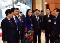 Hình ảnh các nữ đại biểu tham dự Đại hội XIII của Đảng
