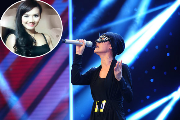 Cô gái đeo mặt nạ bí ẩn thừa nhận là ca sĩ Anh Thúy ảnh 1