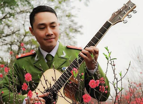 Lớp học guitar cho trẻ em khiếm thị của một Thượng úy trẻ ảnh 1