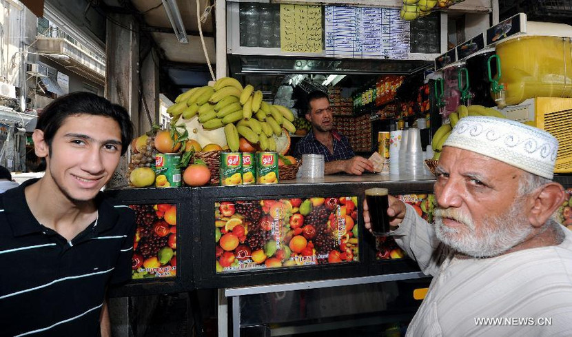 Dân Syria sống bình thản, bất chấp chiến tranh cận kề ảnh 3