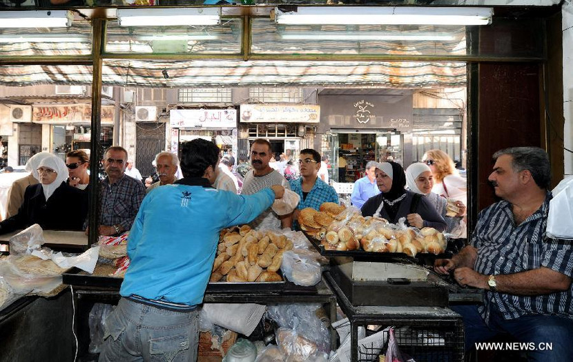 Dân Syria sống bình thản, bất chấp chiến tranh cận kề ảnh 6