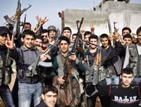 Lực lượng đối lập được Mỹ hậu thuẫn đang làm quân chính phủ Syria khốn đón là ai?