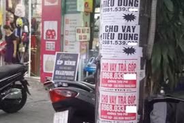 Hà Nội: Từ ngày 1-7, treo, dán, vẽ sản phẩm quảng cáo trên cột điện, trụ điện, cây xanh bị phạt tới 20 triệu đồng