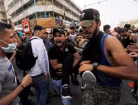 [ẢNH] Iraq tan hoang vì biểu tình biến thành bao động