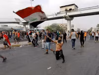 [ẢNH] Iraq tan hoang vì biểu tình biến thành bao động