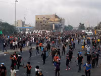 [ẢNH] Iraq tan hoang vì biểu tình biến thành bao động