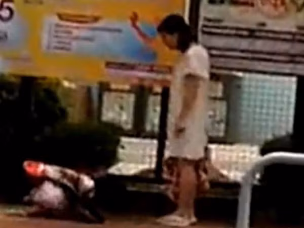 Quỳ lạy "mẹ hổ" giữa phố ảnh 1